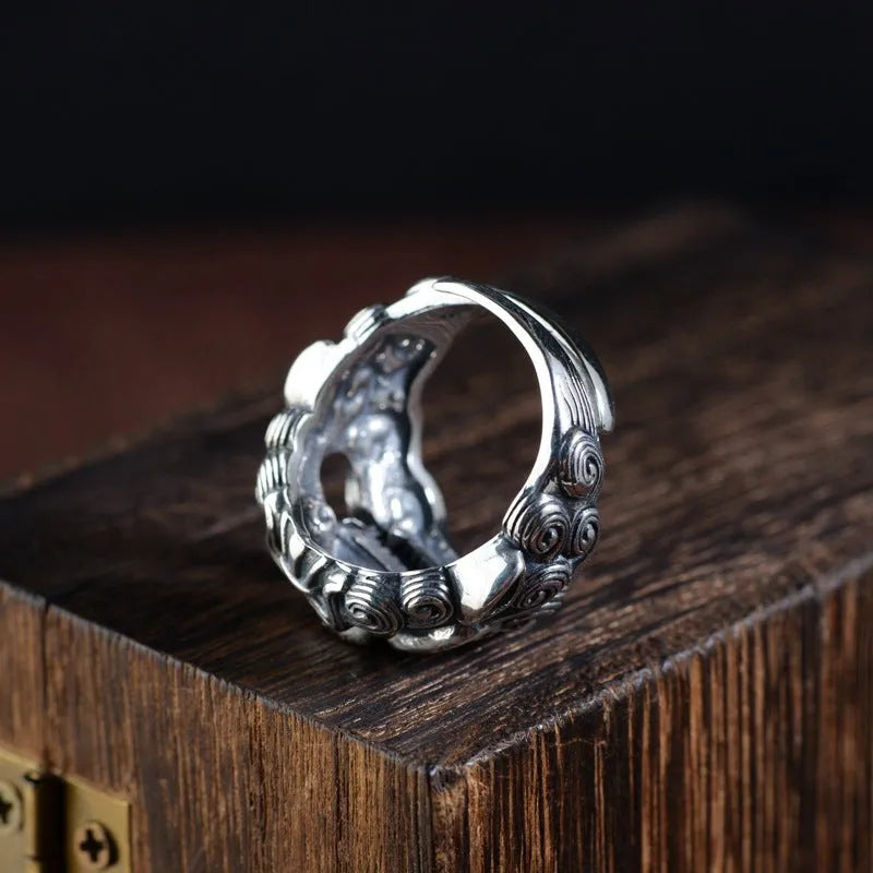 Silver open ring with detailed Jibeast animal zodiac pattern modelling in a retro style.