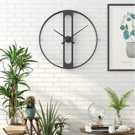 Large round metal wall clock with black or gold frame, 50 cm diameter.