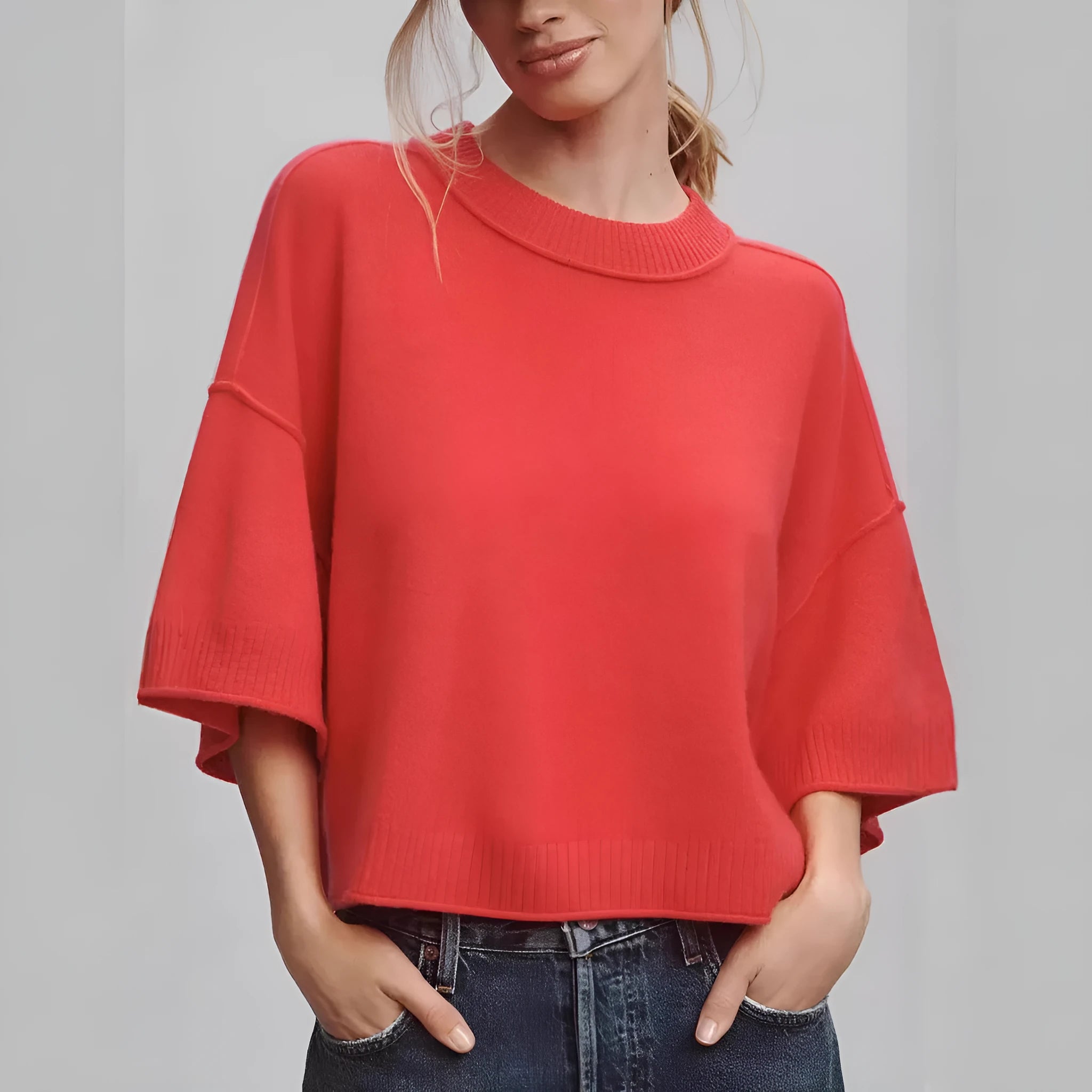 Red short t-shirt on a model showing exposed navel detail, style example for white colour option also available.