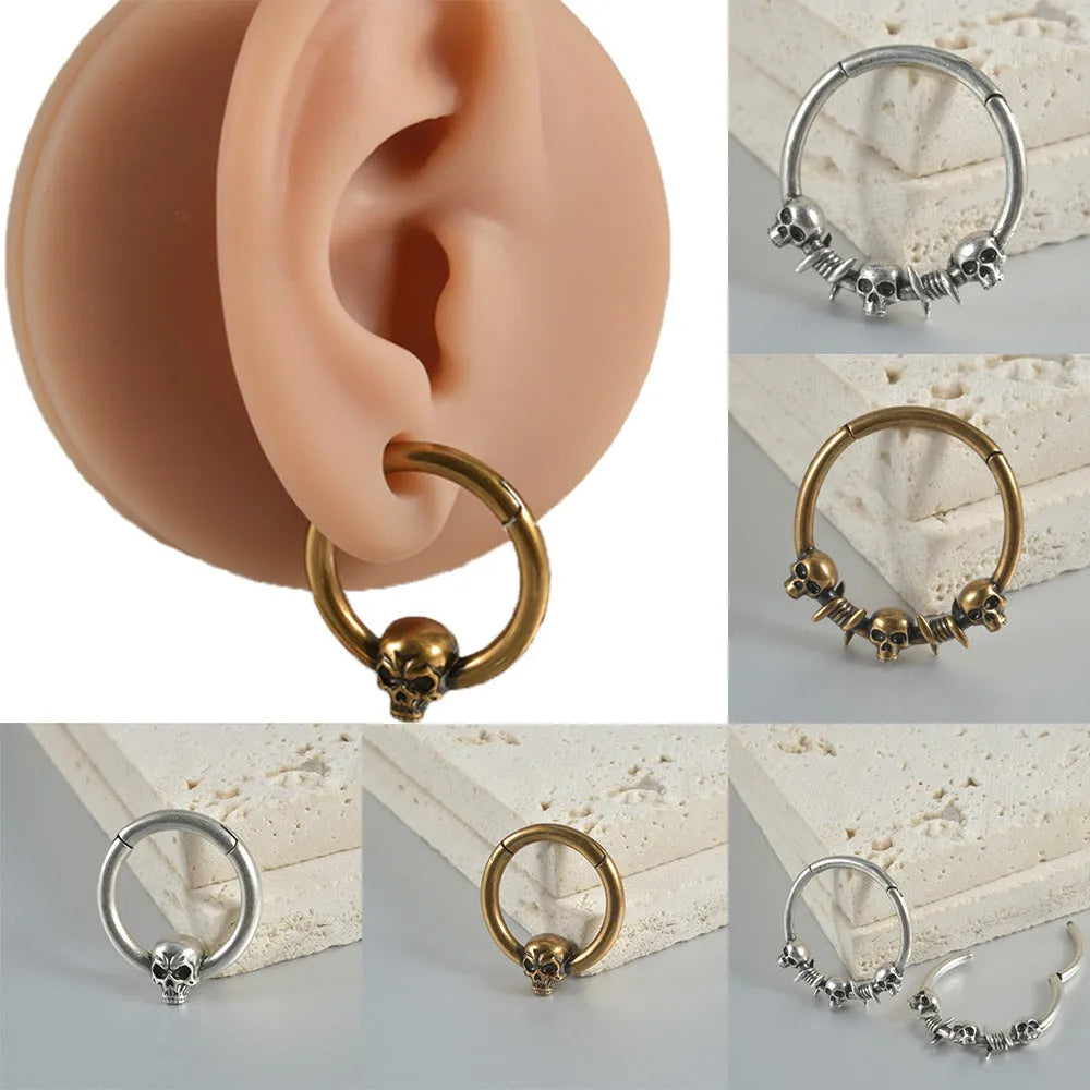 Copper punk-style earrings featuring a ghost head motif in antique silver or gold finish.
