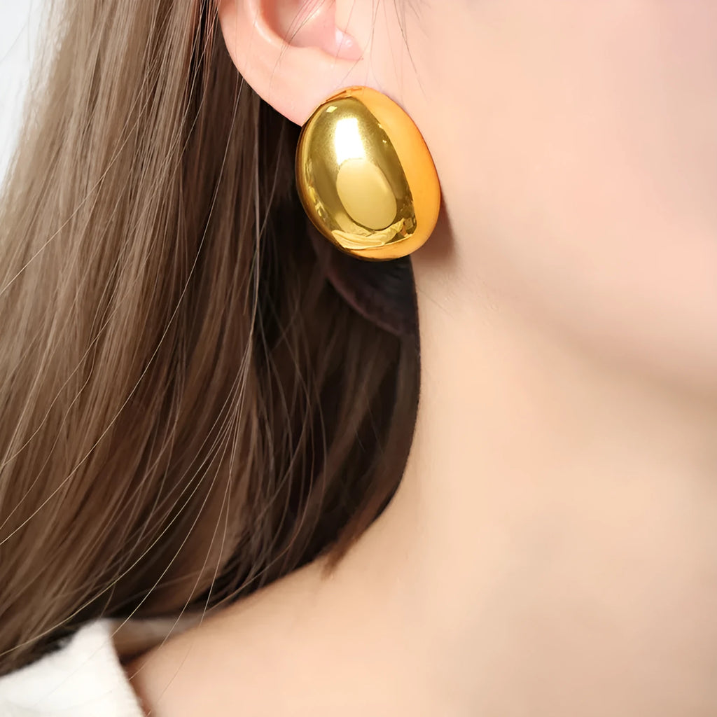 Geometric ear studs with exaggerated glazed surface in 18K gold electroplated stainless steel