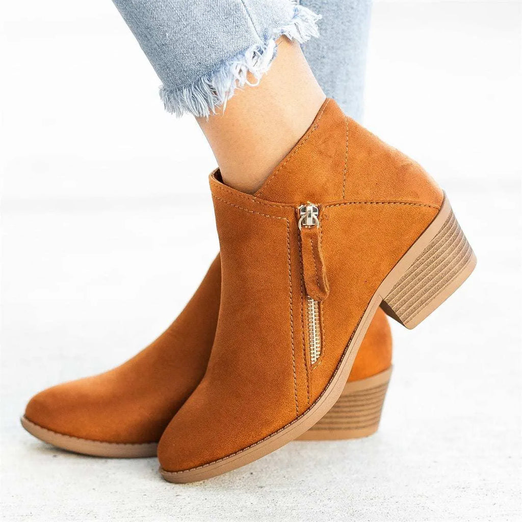 Women's suede ankle boots with chunky heel and side zip fastening in beige, black, blue, and orange colours