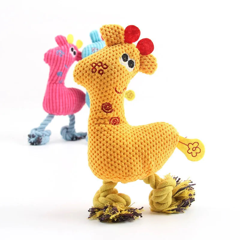 Deer-shaped plush pet toy with corn grain texture in blue, pink, and yellow colour options