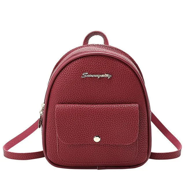 Women's small PU shoulder backpack 18.5cm length in black, blue, grey, pink, or red with zipper closure