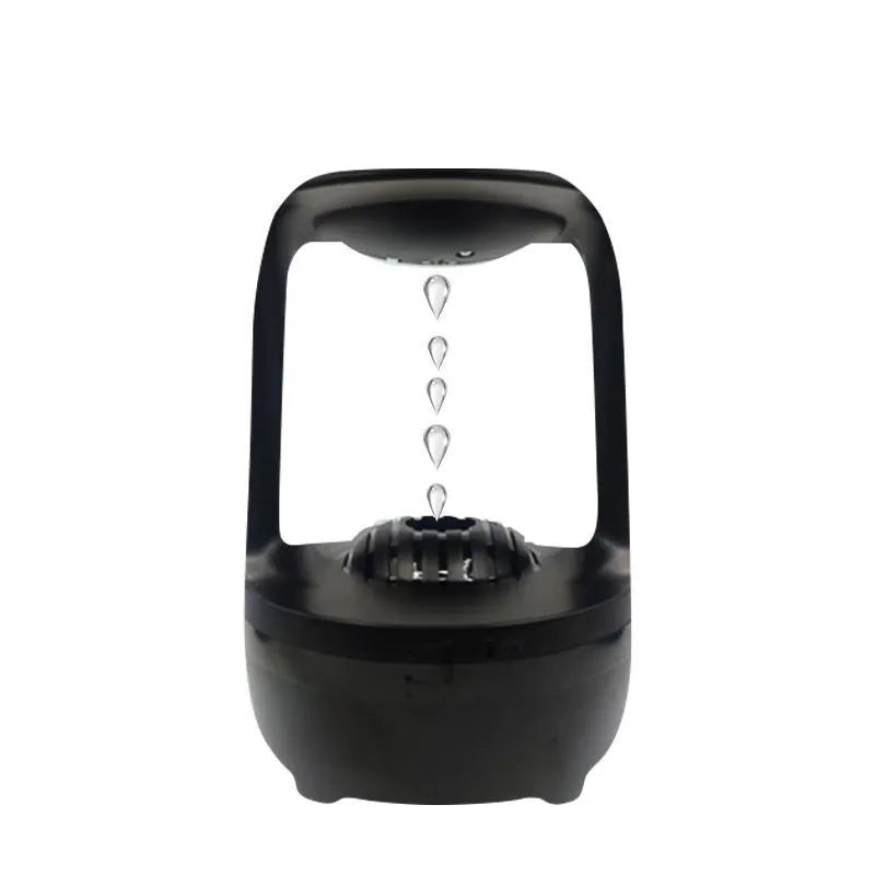 Anti gravity water drop backflow humidifier with 500ml tank in white on a desk