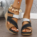 Women's black and red wedge platform slippers with Velcro fastening and fish mouth toe shape.