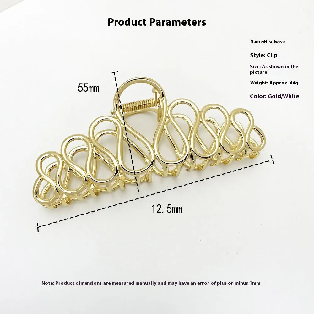Updo minimalist large hair clip in gold, alloy with electroplated finish and tassel detail
