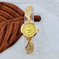 Stainless steel women's watch with round dial and vachette clasp, shown in gold, black, and white colour options.