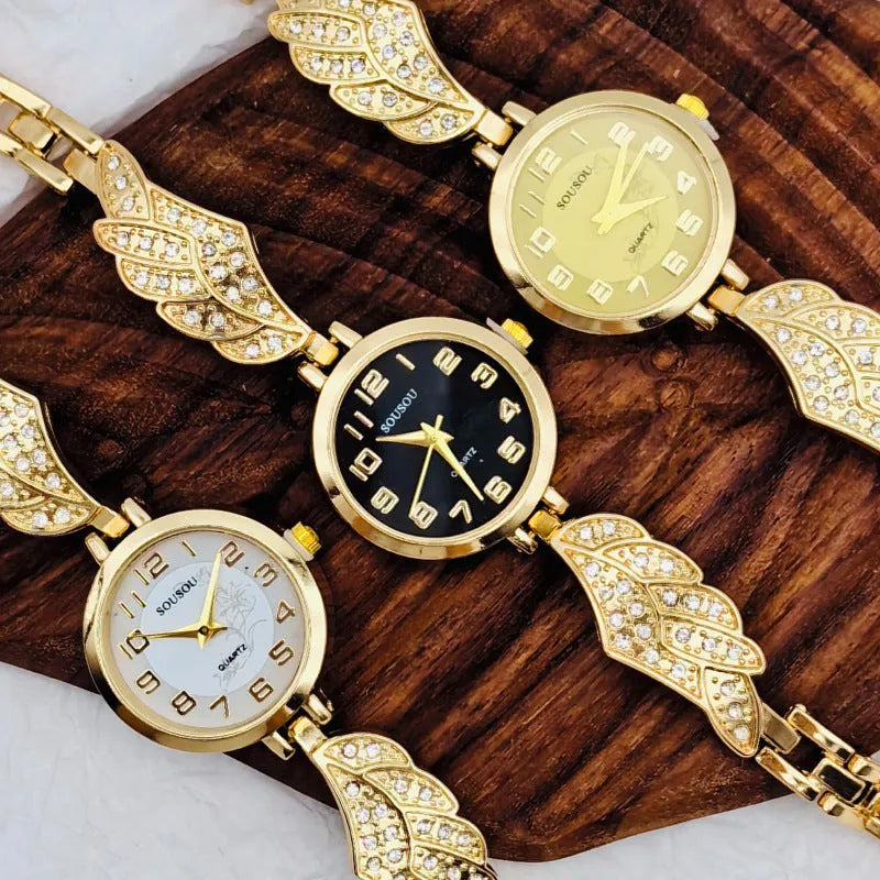 Stainless steel women's watch with round dial and vachette clasp, shown in gold, black, and white colour options.