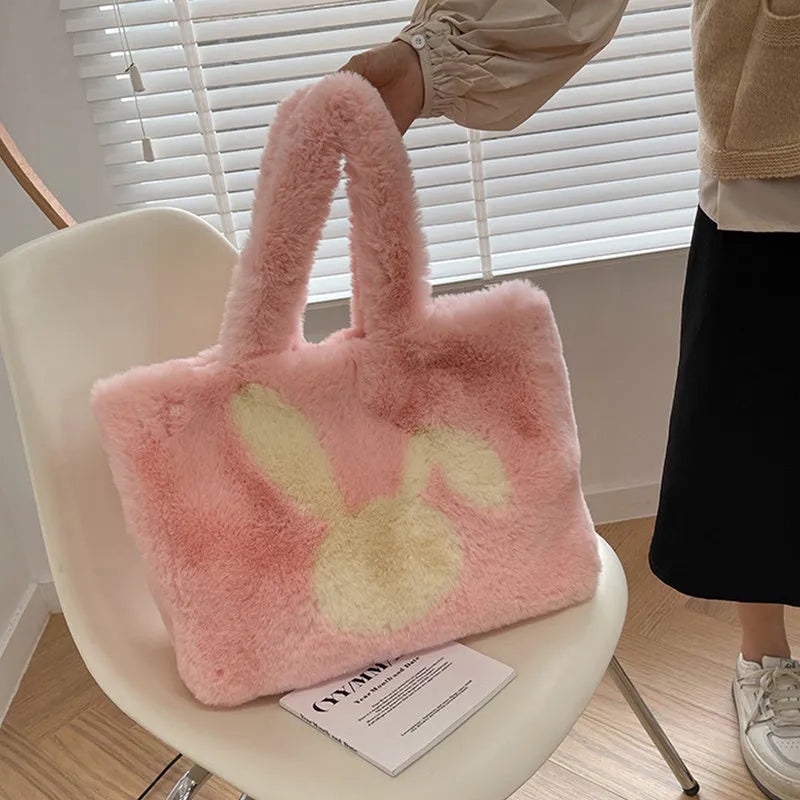 Women's plush shoulder bag with cartoon rabbit ears decoration in solid colour options