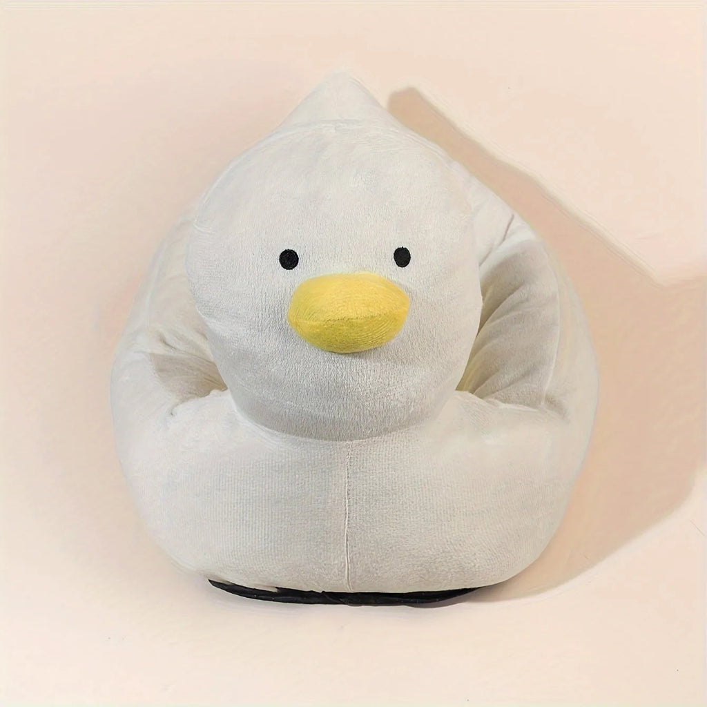 Blue duck-shaped fluffy pet bed sofa for small dogs and cats on wooden floor