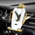 Car phone holder with wireless charging base and suction cup mount in black and gold colour with eagle design