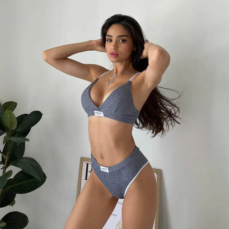 Female bikini set with embroidery and contrast colour binding letters in black, grey, or white