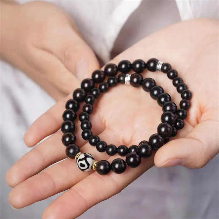 8mm ebony wood two-circle unisex retro bracelet on a white background