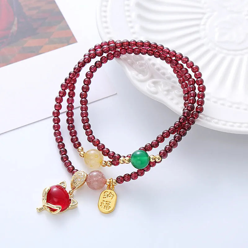 Natural garnet crystal fox bracelet for women in purplish red with adjustable rope