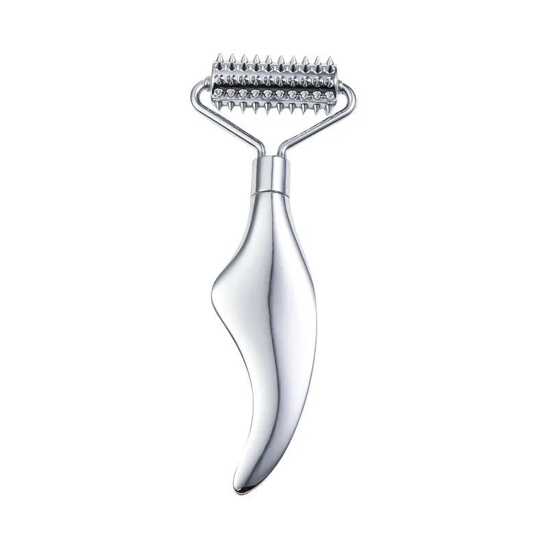 Stainless steel facial massage board set with heart-shaped eye roller and scraping plate on simple packaging