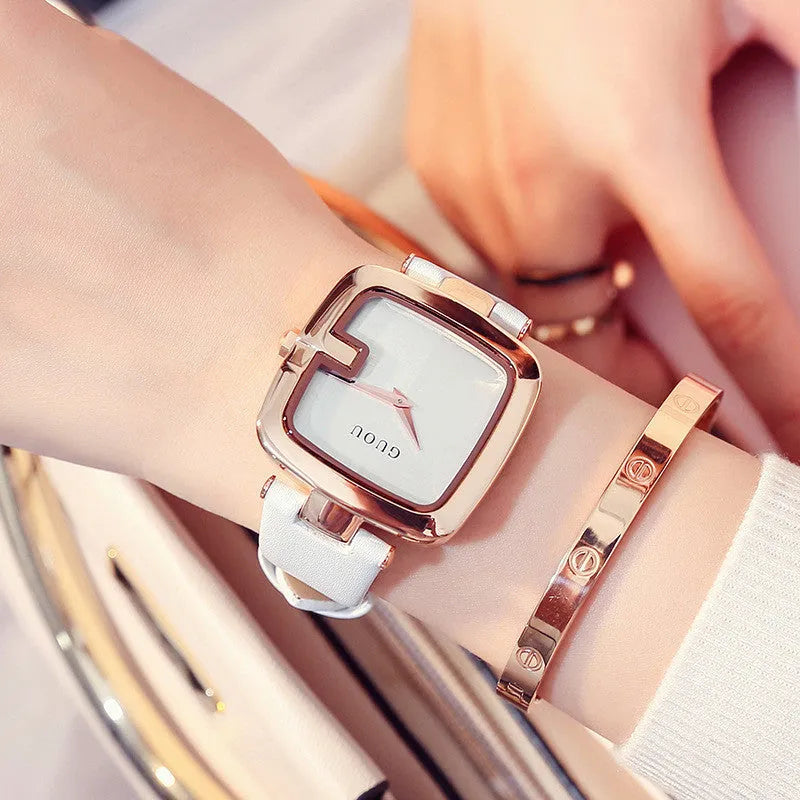 Square quartz watch with 36mm dial, leather strap, rose gold buckle, and mineral glass