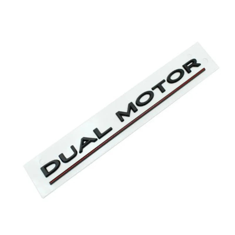 Tesla Model 3 Dual Motor bumper sticker in ABS plastic, shows matte black and silver colour options.