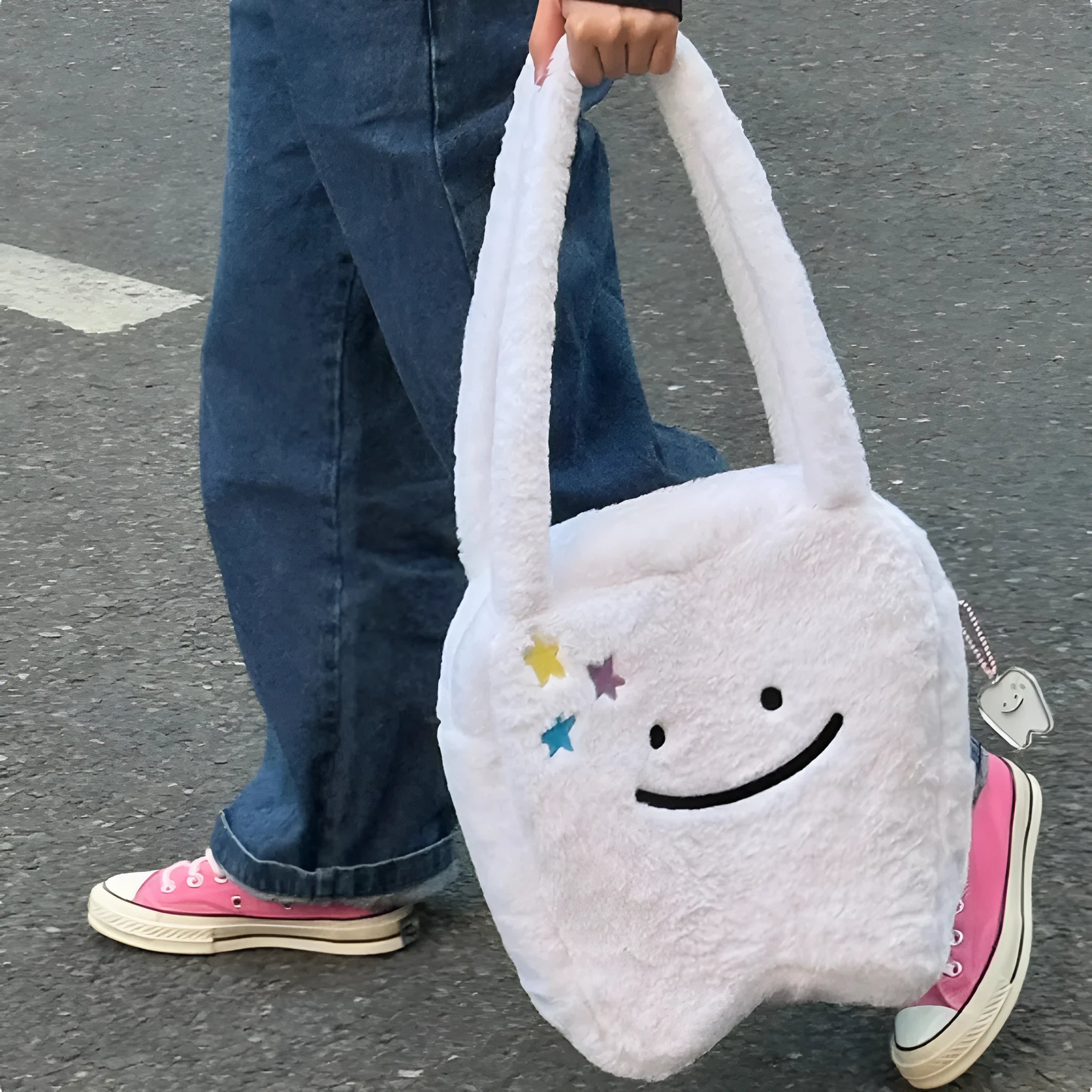 White plush large tooth design shoulder tote bag with a zipper, shown as a unisex crossbody bag.
