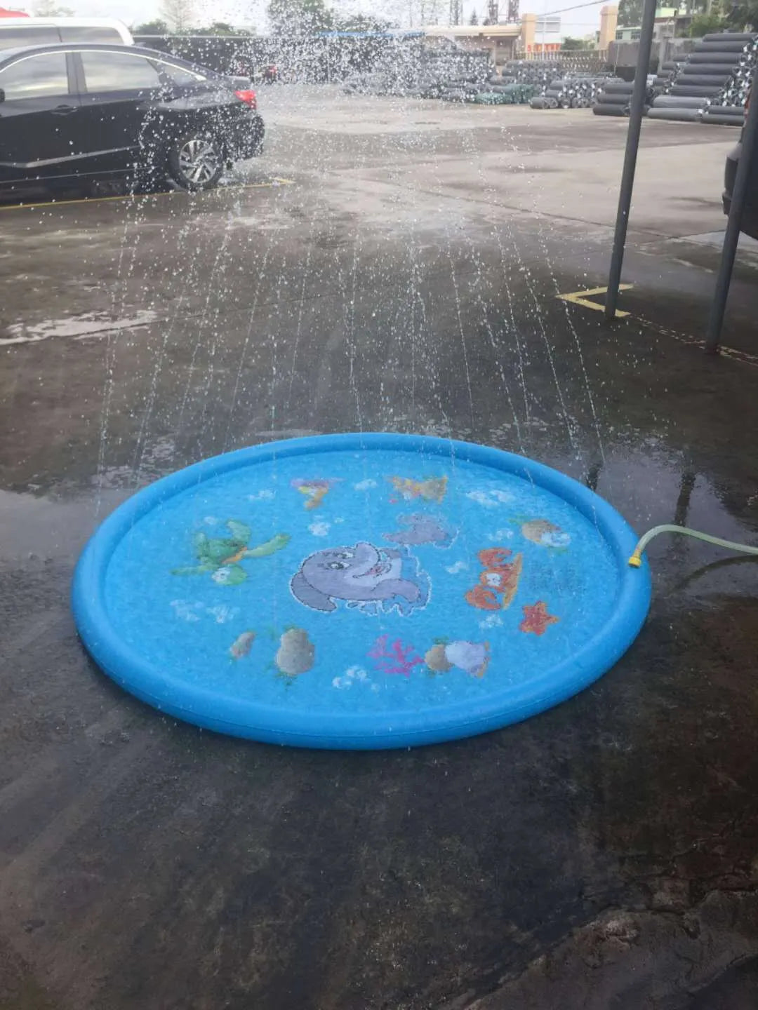 Blue PVC children's water spray play mat with marine animal designs, shown in 100cm and 170cm sizes.