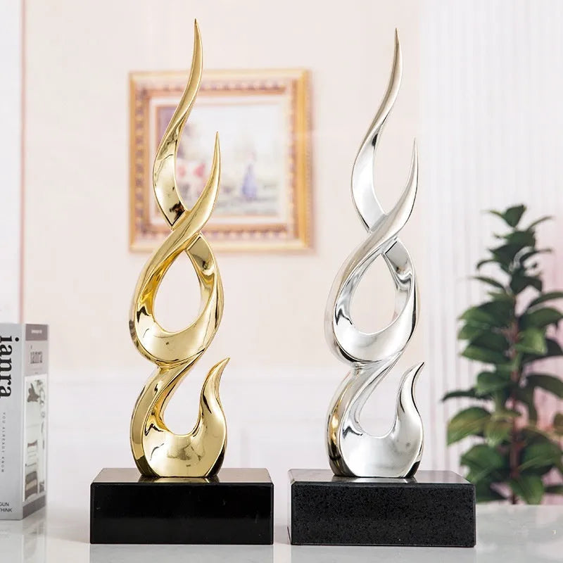 Resin high-rise festival decoration craft in bright gold colour with modern simple design
