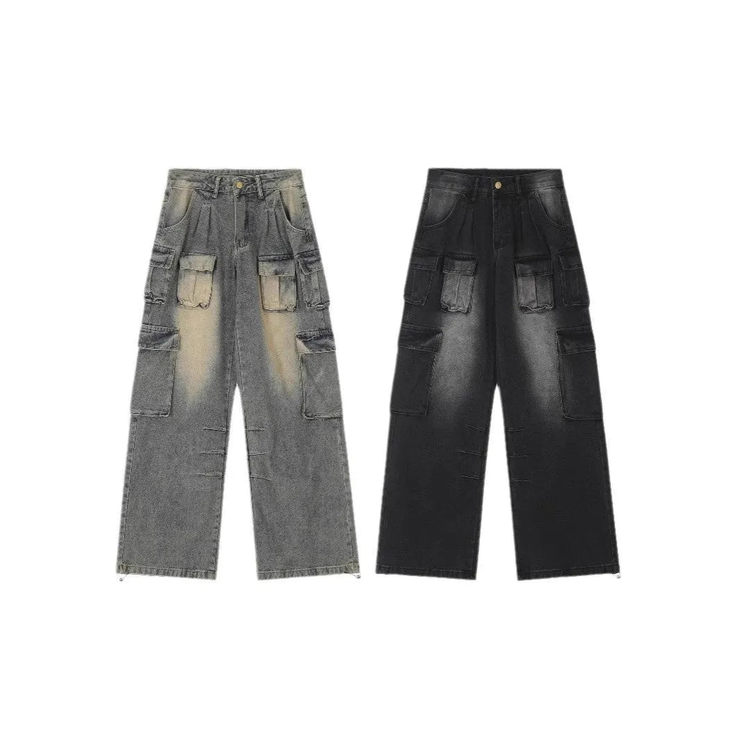 Man wearing loose fit light blue distressed jeans with multiple tooling pockets and straight leg silhouette.