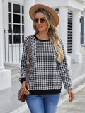 Black polyester pullover sweater with printed plaid pattern and long sleeves