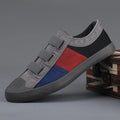 Men's low-top canvas sneakers with elastic band closure and rubber soles in beige colour