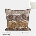 Cream and coffee-coloured abstract coil pattern on a square decorative pillow cover.