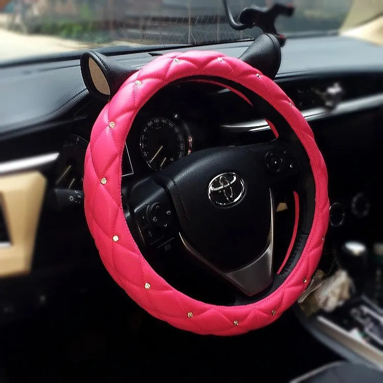 Black Rose Red steering wheel cover with rhinestones from Super Cute Ear series on a car steering wheel