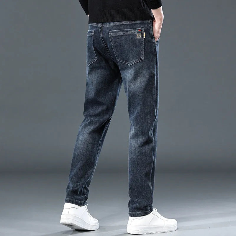 Slim straight casual trousers in black with micro-elastic fabric and mid-waist design