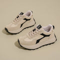 Women's solid colour low-top platform sports shoes with a rubber sole and front lace-up.
