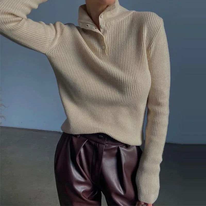 Women's silver grey slim fit pullover sweater with a single-breasted half turtleneck neckline detail.