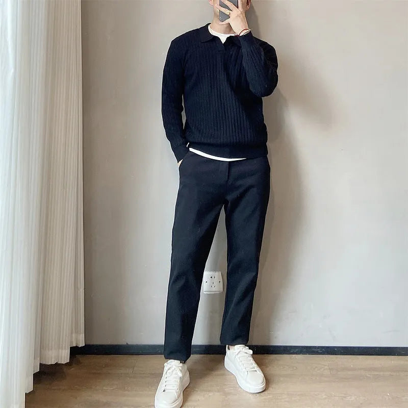 Man wearing a loose fit striped lapel pullover sweater in a rabbit fur and modal blend.