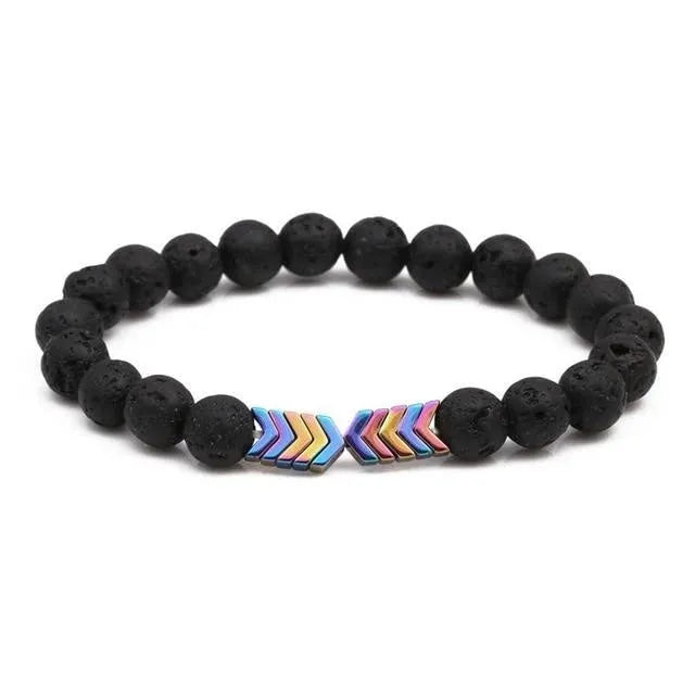 Purple Arrow volcanic stone bracelet on a neutral background showing bead texture and elastic cord