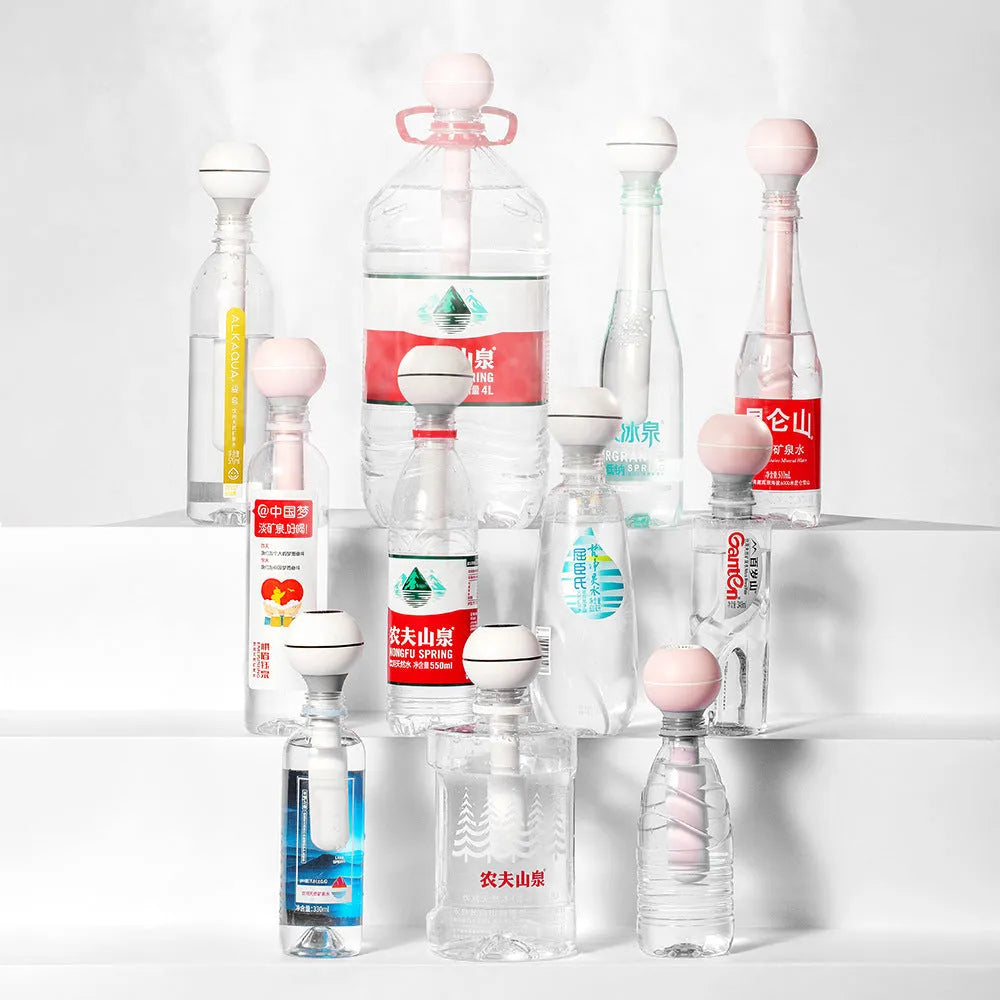 Magic wand style ultrasonic humidifier with columnar design in pink or white colours