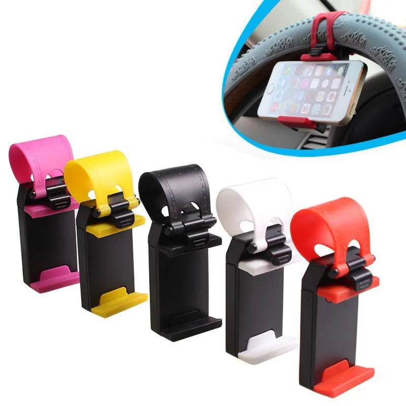 Black steering wheel phone clip holder mounted on car steering wheel
