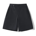 Men's solid colour quick-dry sports shorts with elastic waistband shown in Army Green