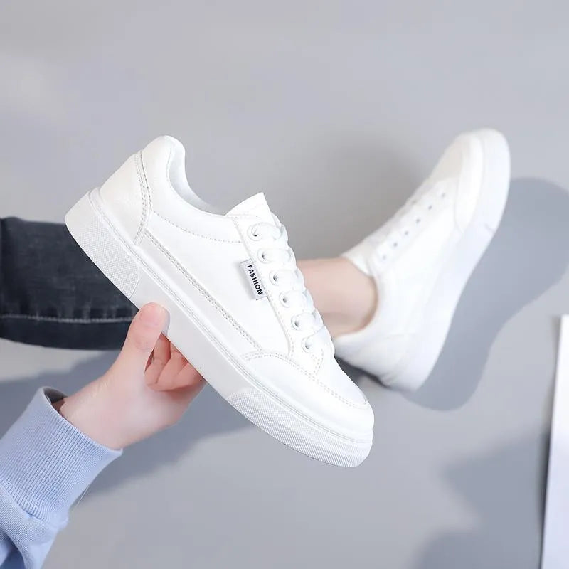 Korean-style white women's low-top sneakers with artificial PU uppers and plastic soles