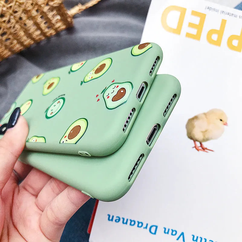 Green avocado cartoon design on a flexible black TPU phone case for iPhones and Android.