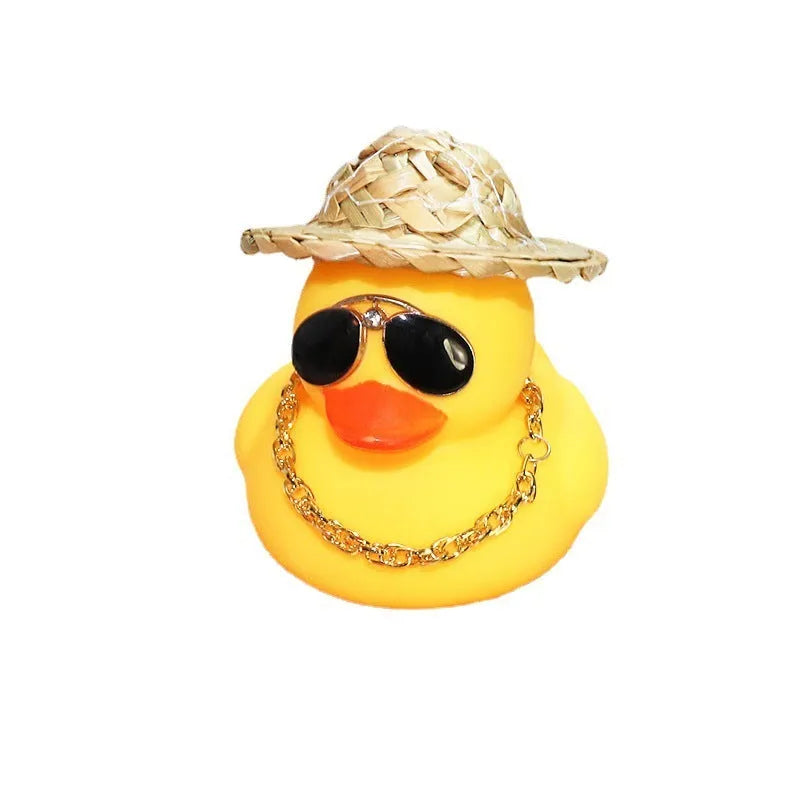 Yellow cartoon duck with straw hat car dashboard ornament on adhesive base with sunglasses necklace