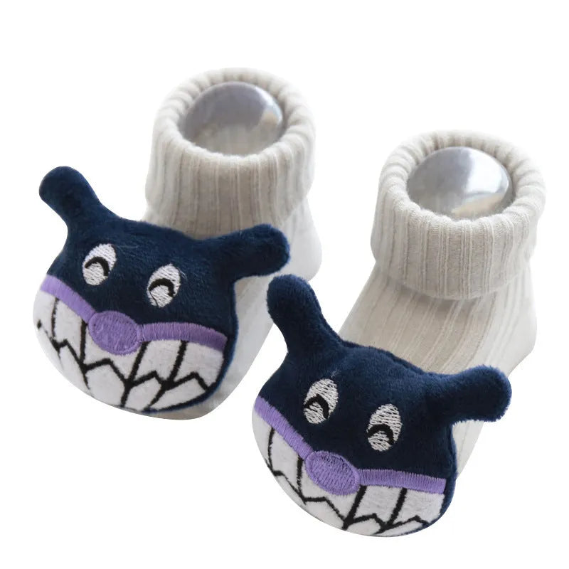 Cotton baby socks in blue bow design showing breathable fabric and size options for 0-3 month olds