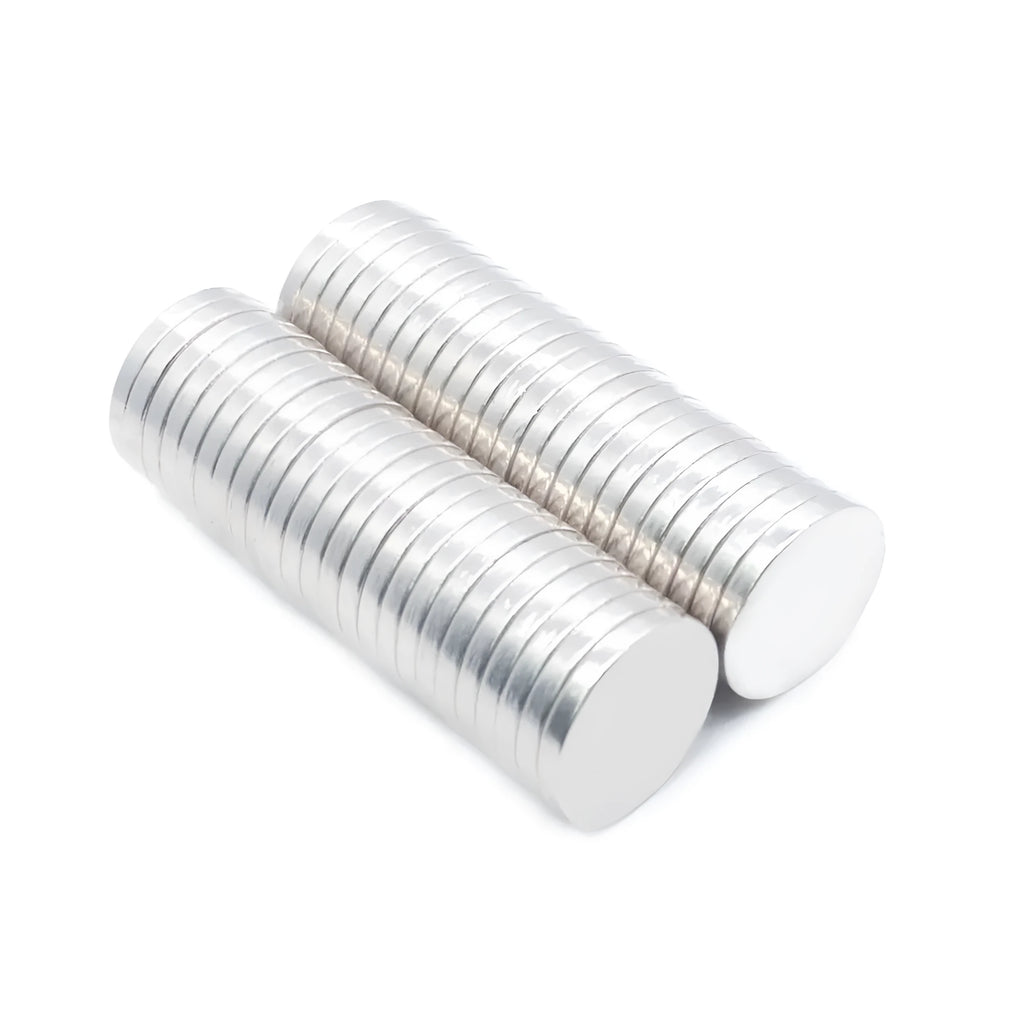 Silver NdFeB disc magnet 14mm diameter 2mm thickness on white background
