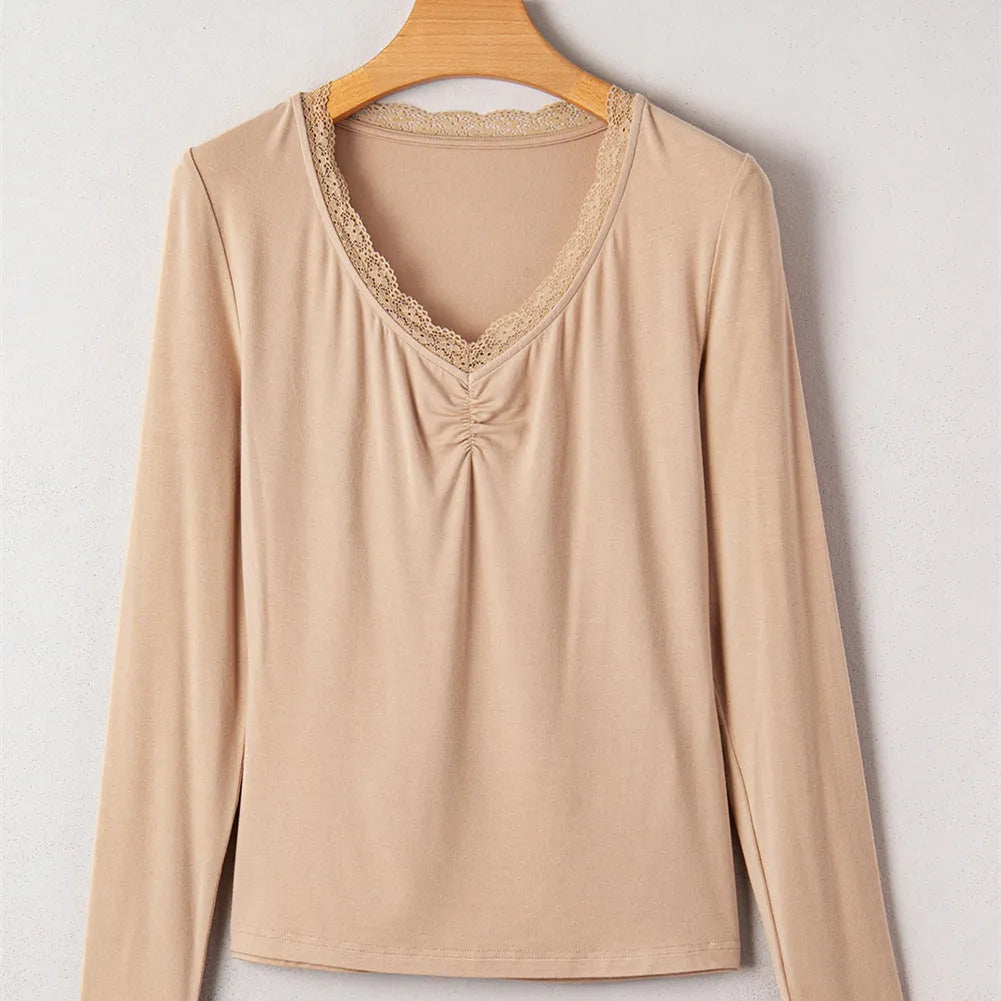 Women's solid colour casual top with lace trim on long sleeves in slim fit silhouette