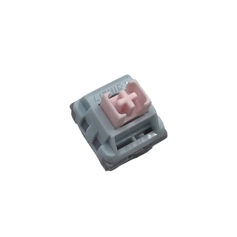 Four custom linear silent mechanical keyboard switches showing three-colour POM shaft core.