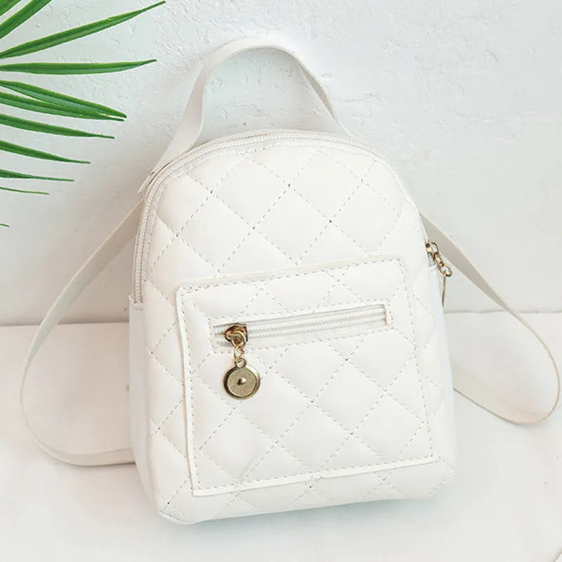Korean style girls' embroidered PU backpack in white with hard shell construction and sandwich pocket