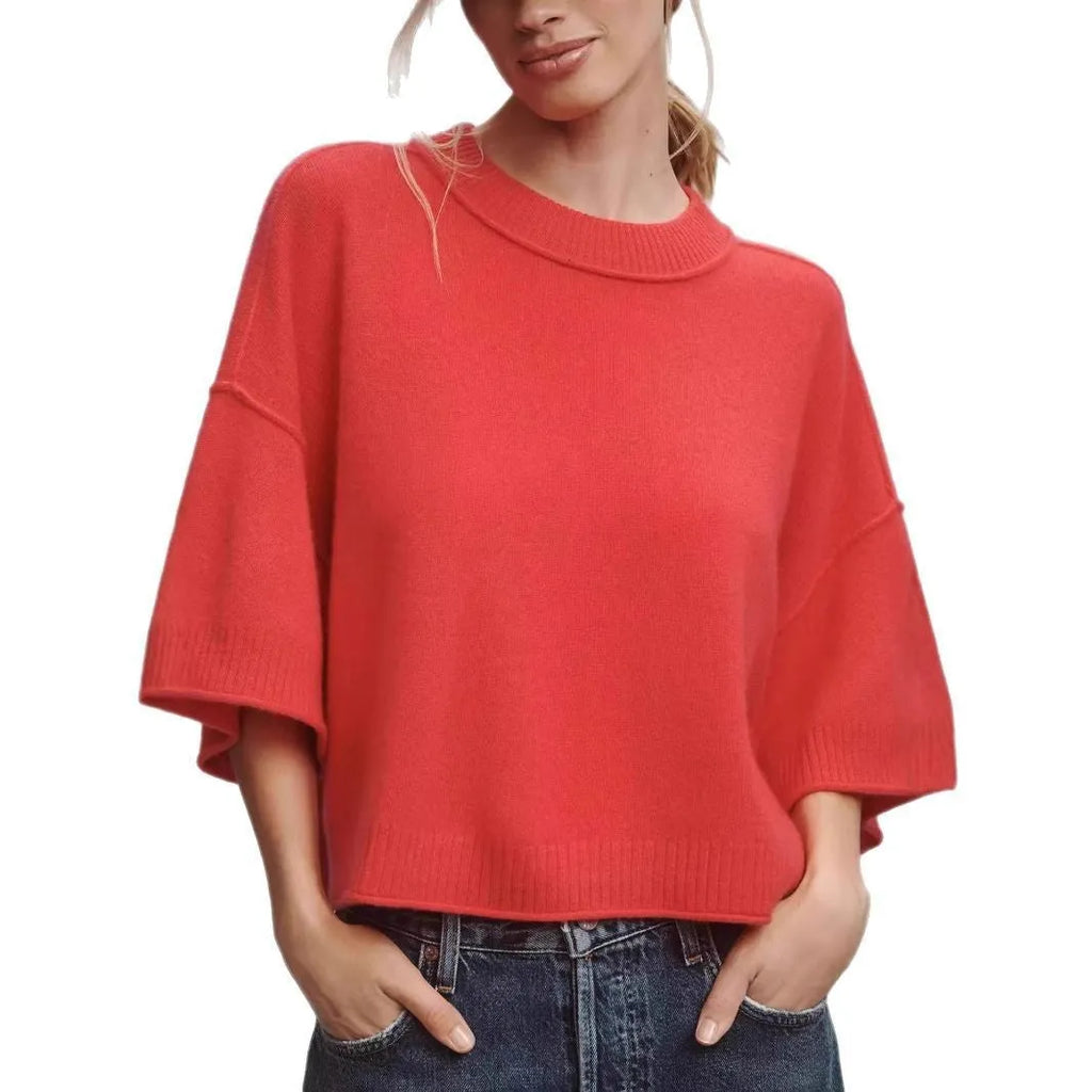 Red short t-shirt on a model showing exposed navel detail, style example for white colour option also available.