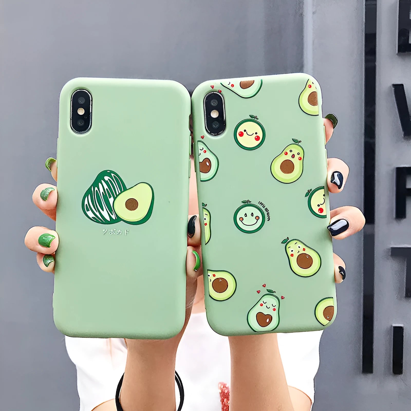 Green avocado cartoon design on a flexible black TPU phone case for iPhones and Android.