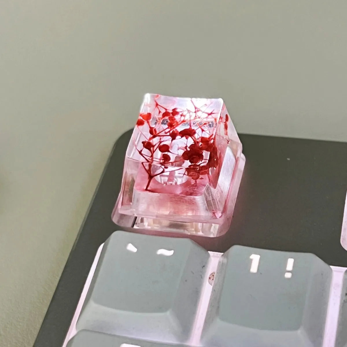 Transparent resin mechanical keyboard keycap showing starry sky galaxy design in multiple colour options