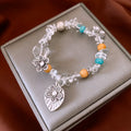 Retro ethnic style gravel flower bracelet for women, alloy electroplated, blue colour variant
